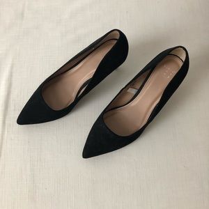 Black pointed toe pumps